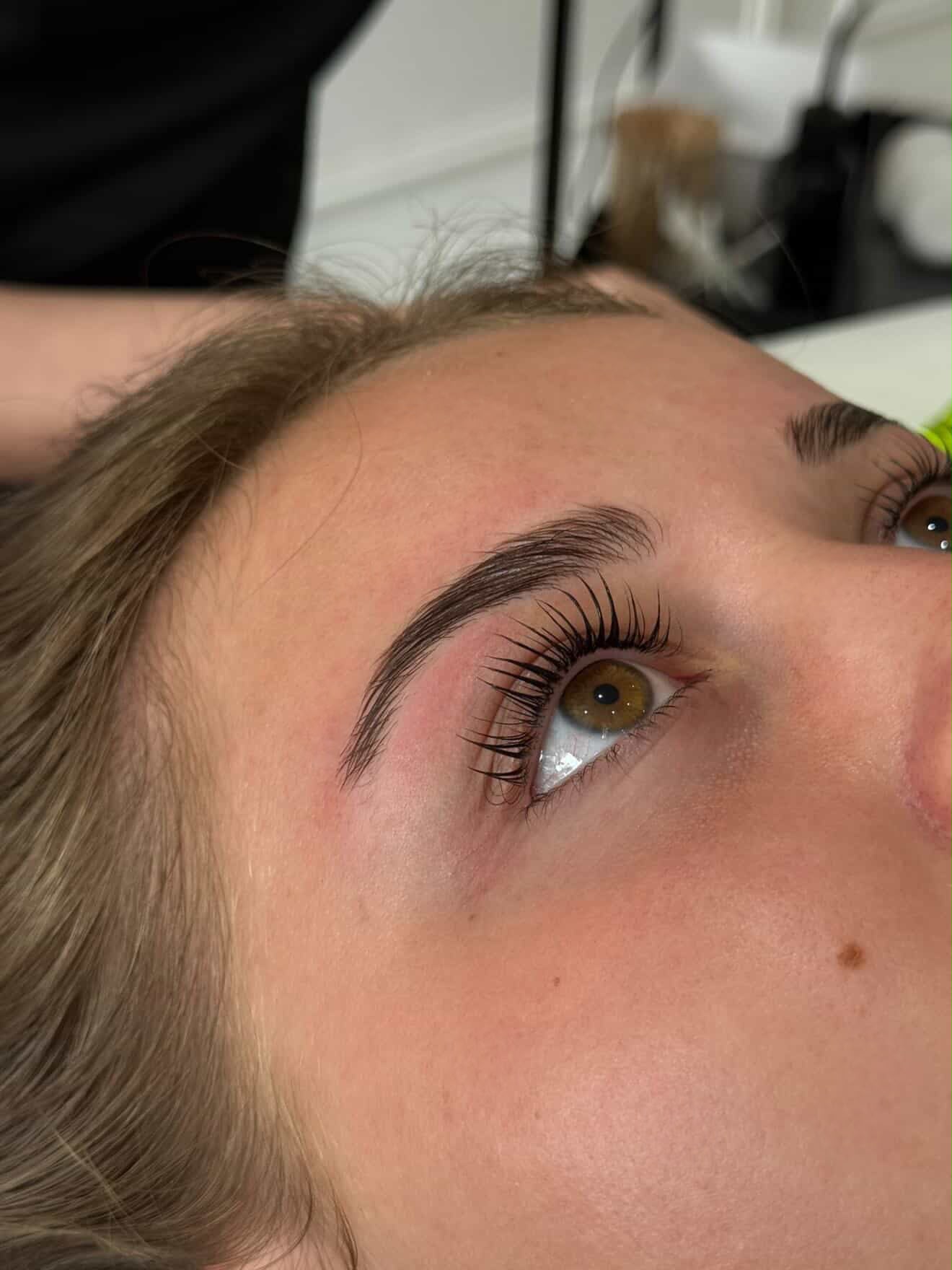 Close-up of the eye and natural lashes after a beauty treatment