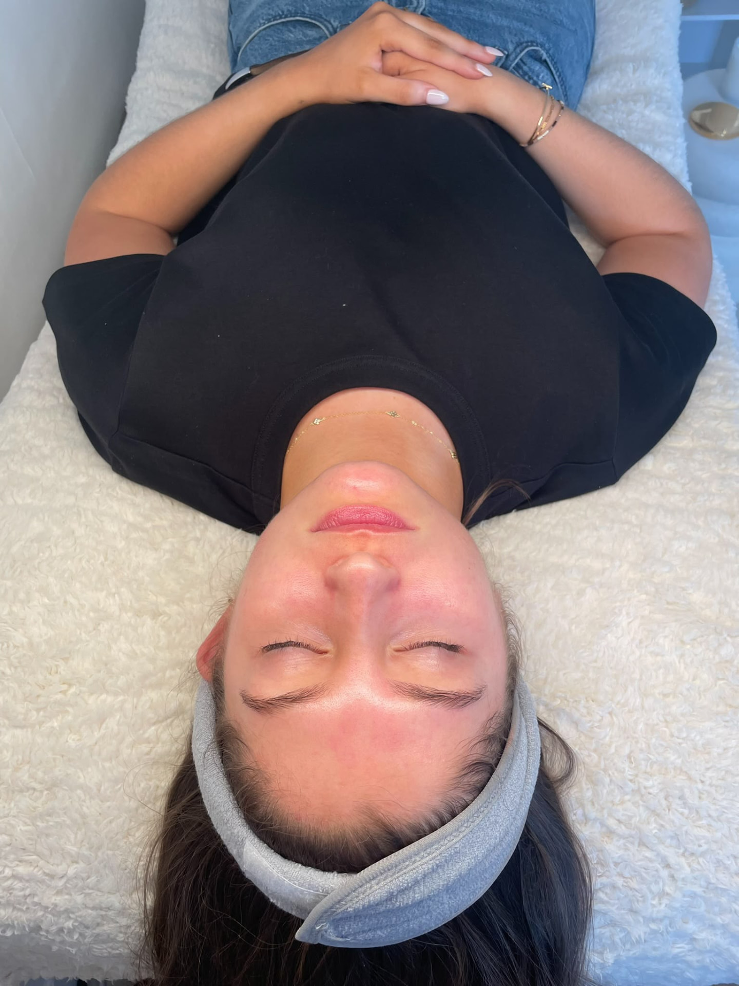 Client immediately after a facial showing temporary redness across the forehead and cheeks